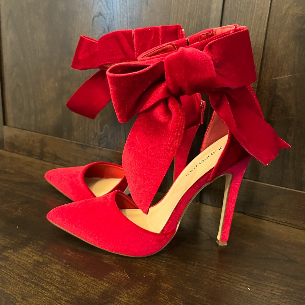 Red ankle bow point toe zip back heels worn twice 4inch heel